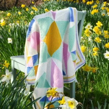 Geometric Blanket Knitting Pattern by Nicola Valiji in WoolBox Imagine Classic & Lullaby DK  
